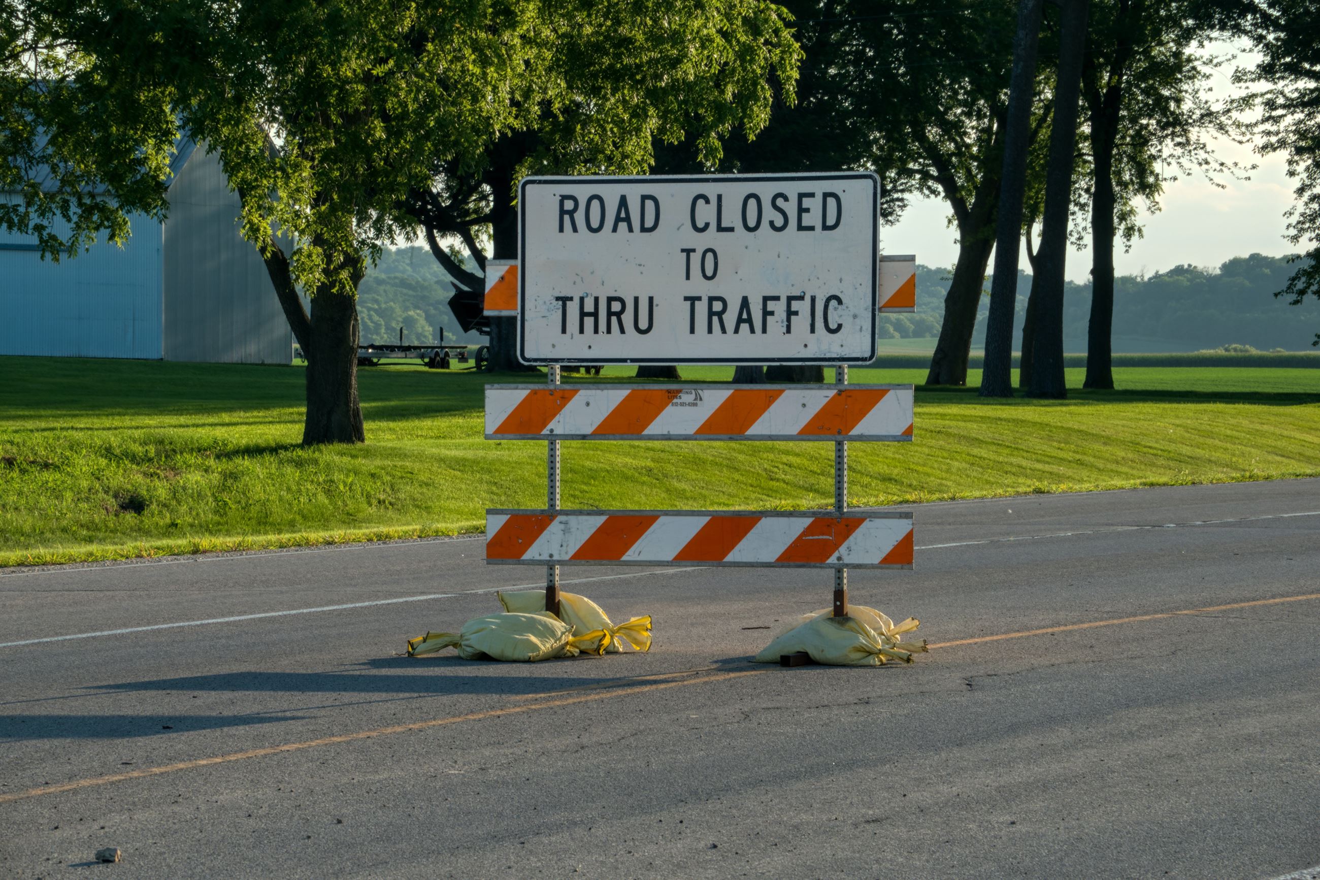 Sign that reads Road Closed 