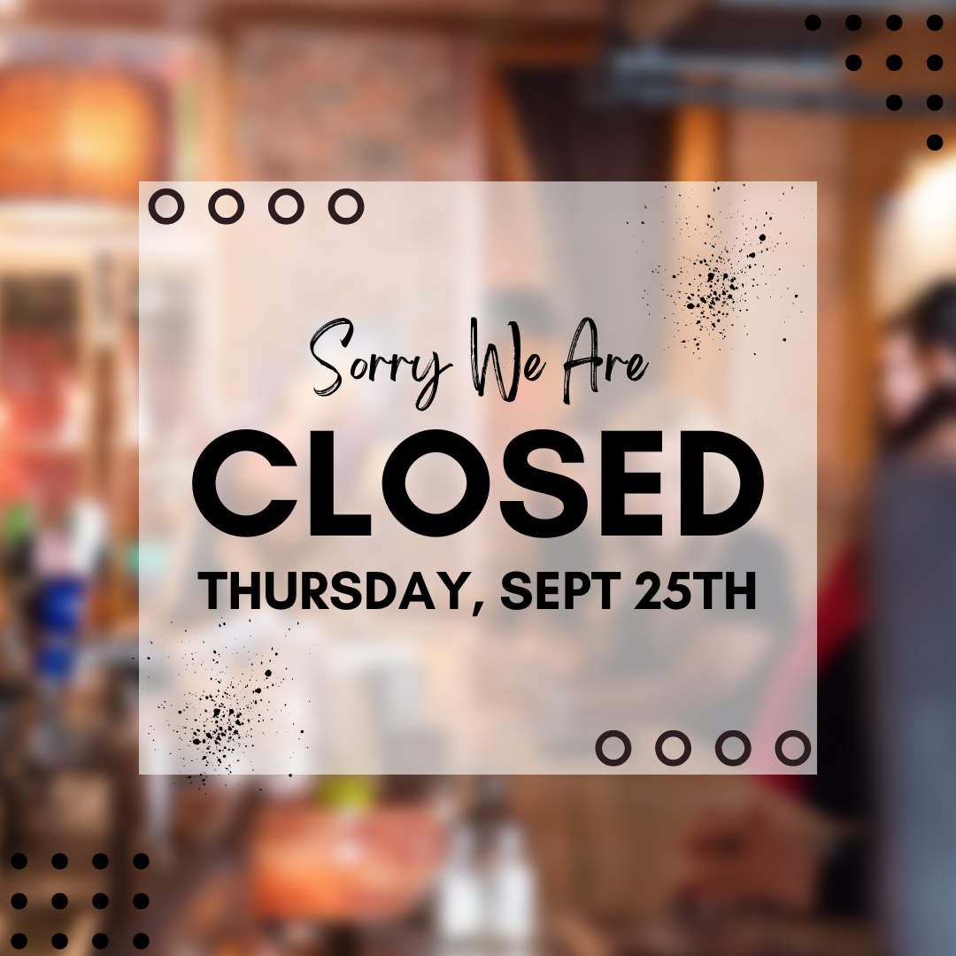 A purple rectangular sign with white text says, 