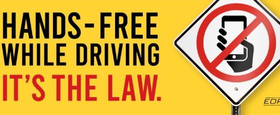 A graphic of a phone on a sign against a yellow background 