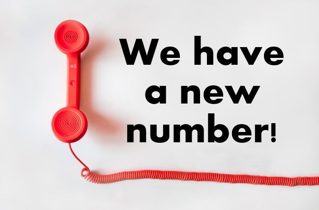 A pink phone receiver on a white background 